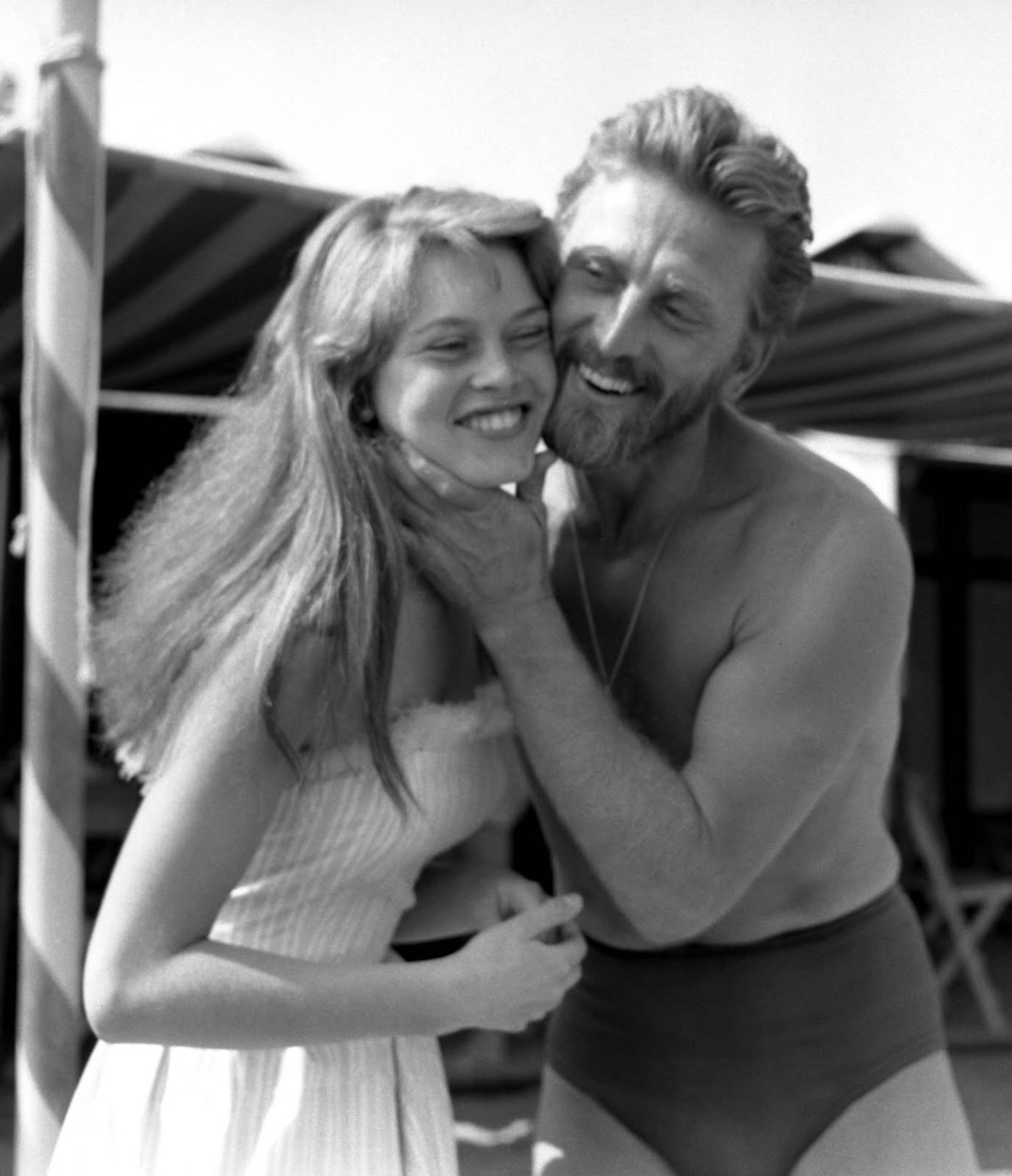 Brigitte Bardot goofing off with Kirk Douglas at the Cannes Film Festival in 1953. Douglas is still going strong at age 100, has been happily married for 63 years with 4 successful boys.