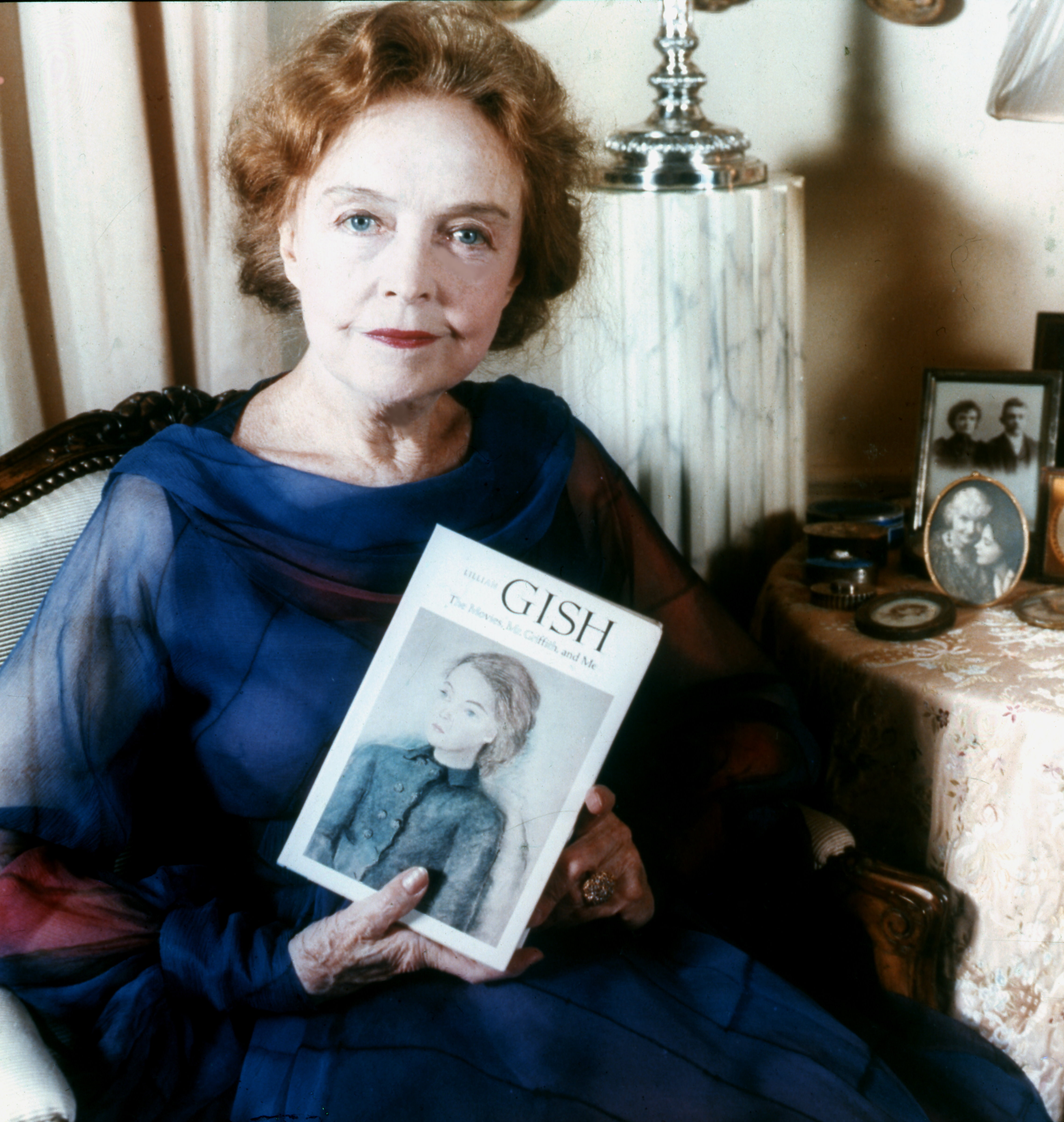 Lillian Gish holding her biography that she worked on in 1973. Gish lived to be 99, passing in 1993. She did films starting in 1912 all the way up to 1987.
