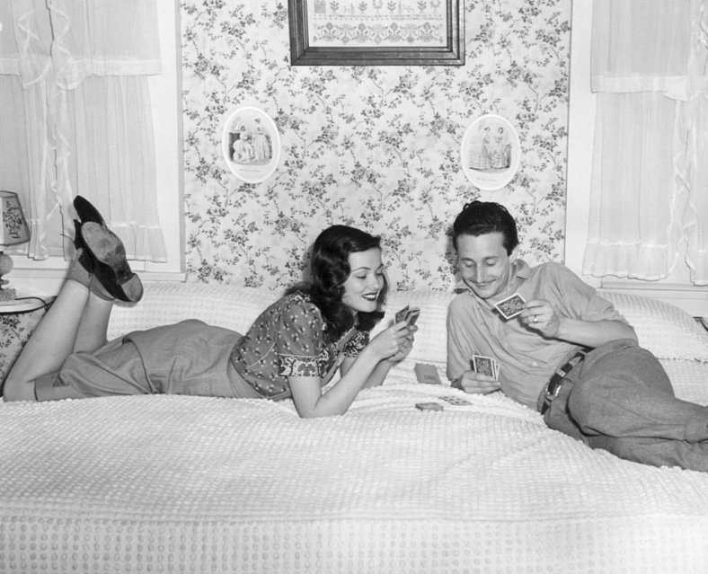 Gene Tierney playing cards with her then husband Oleg Cassini in 1944. The couple were married for 11 years up until 1952, and had 2 children. Cassini was a successful fashion designer in his own right. Tierney would marry again in 1960. Tierney carved out a successful career with her good looks and strong acting. She started as a pinup model before becoming an actress, and maintained a solid career for nearly 30 years before retiring in 1969.