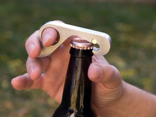 Ok, how about a one-handed beer opener? Say goodbye to the days of having to take your hand out of the Doritos bowl to open a beer.