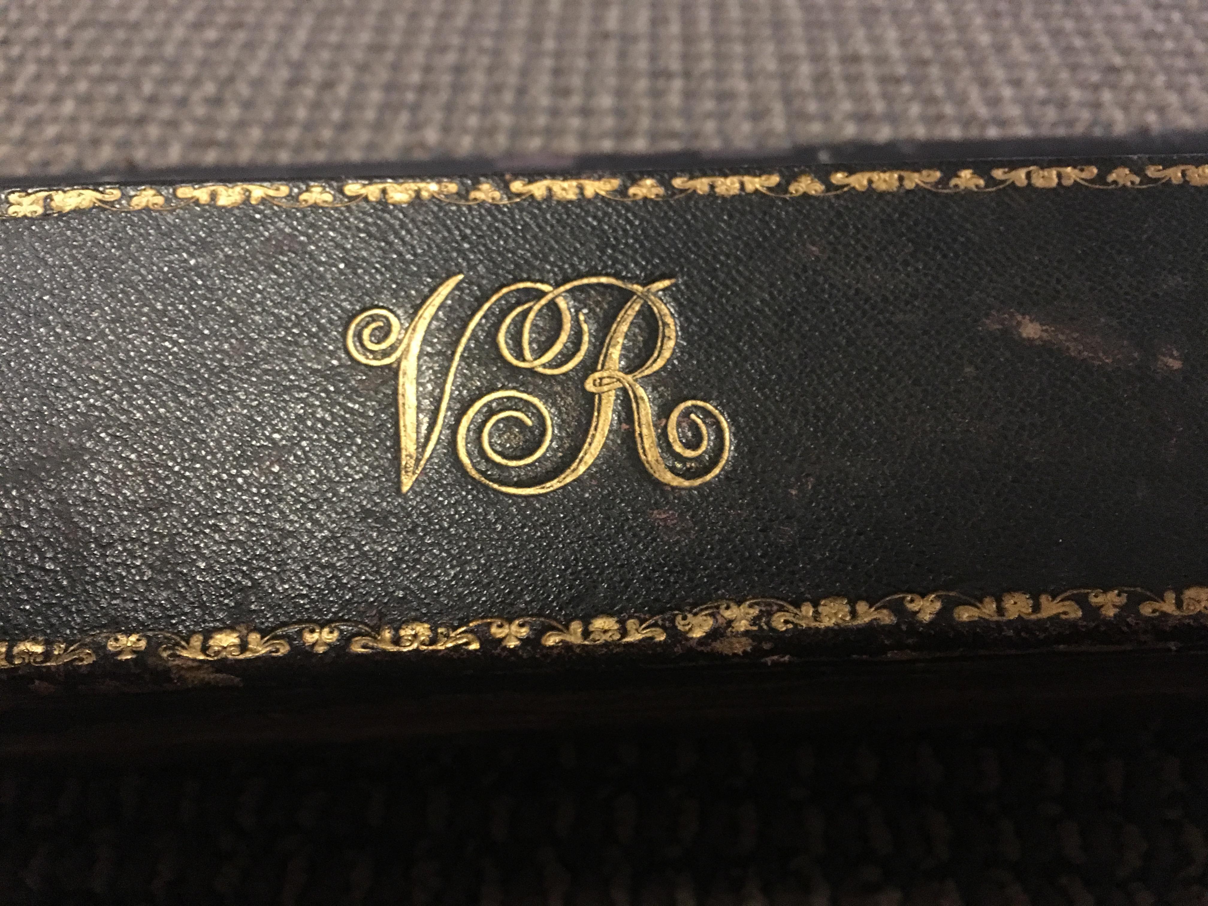 close up of initials on the box