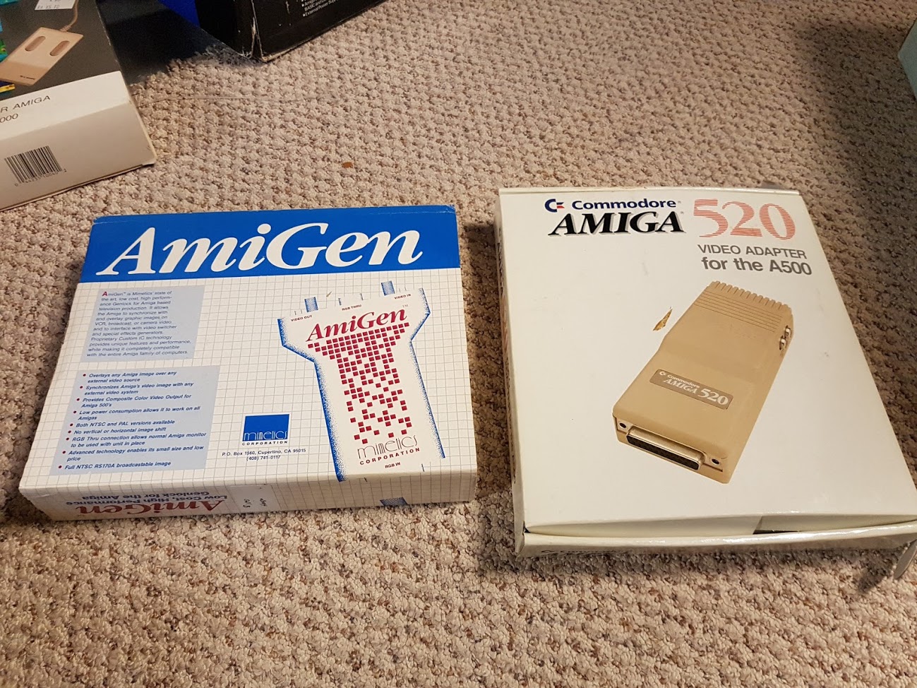 Amiga Genlock device for overlaying Amiga graphics on top of live video and the Amiga 520 RF modulator.