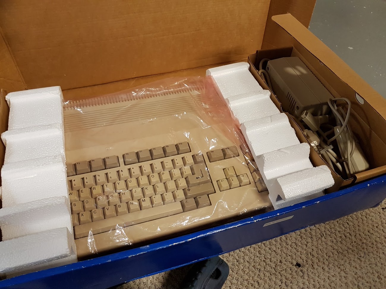 First Amiga. Power supply and mouse.