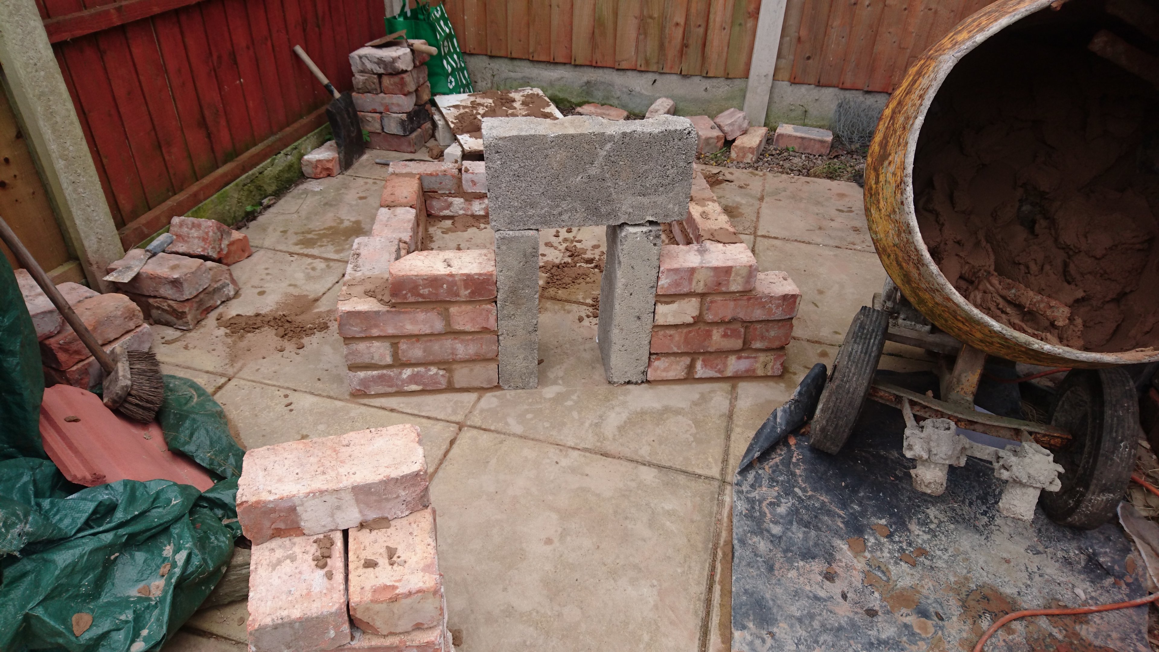 "Using the cement blocks helped to ensure the doorway was perfectly straight. As the mortar started to set, its now time to use the brick jointer to give that nice smooth finish on the joints."