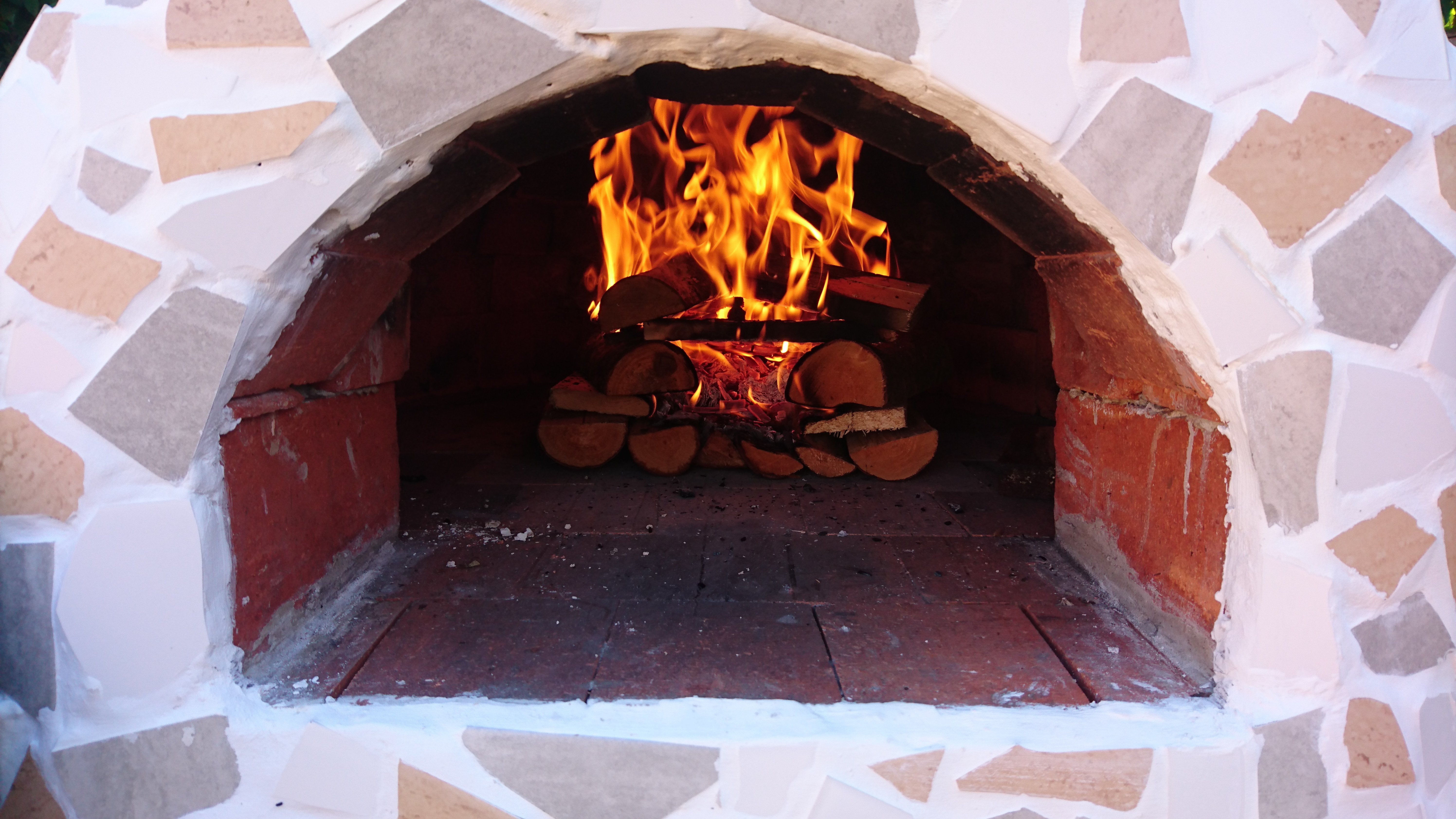 "Heating the oven up takes around 1 1/2 hours to reach optimum temperature (350-370 degrees celcius) Perfect pizza cooking temperature. I find the easiest way to light a fire is using the fortress method."