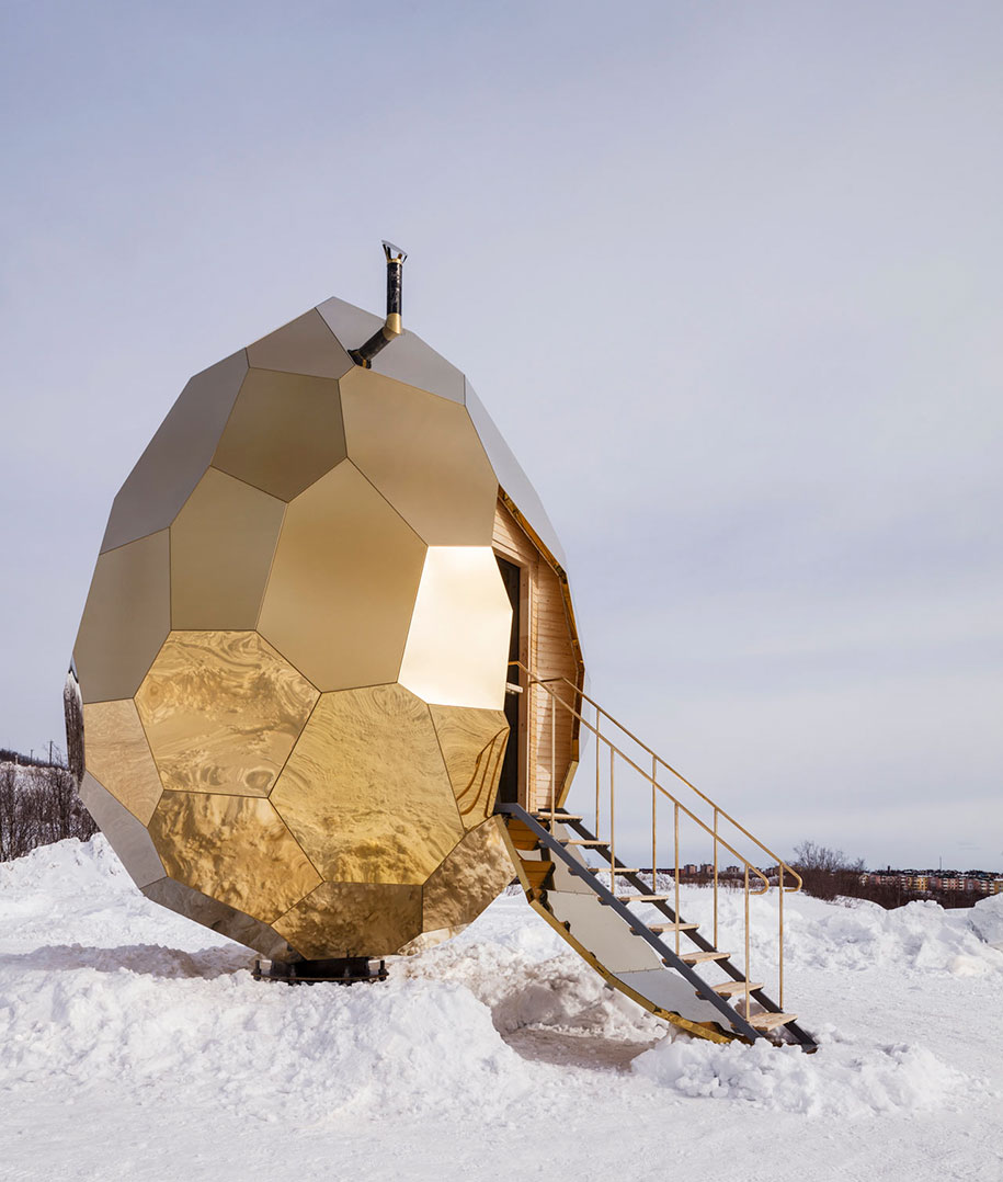 Meant to symbolize the rebirth of a once an iron ore mining town, the egg spans 5 meters tall (~ 16.5 feet) by 4 meters wide (~ 13 feet) and features a gold-plated stainless steel shell that also reflects the contrasting landscape around it. It’s constructed out of 69 detachable pieces, which allows the whole structure to be disassembled and moved to another location.
