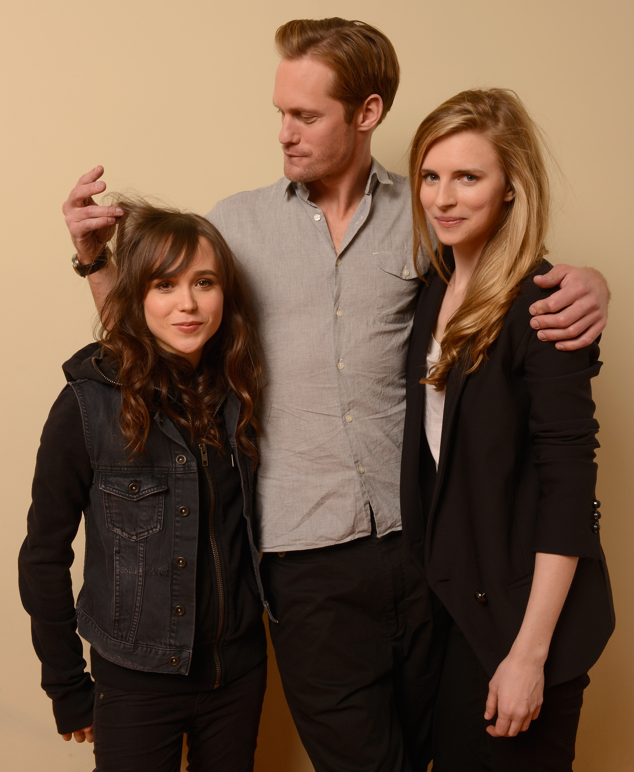 Ellen Page, Alexander Skarsgård and Brit Marling pose for a portrait for the 2013 Sundance Film Festival. This was one of the unused pictures as Skarsgård was goofing around. The 3 starred in a film called The East, and all became friends. Rumors circulated that Skarsgård and Page were an item, which was totally rebuked the following year as Page came out as gay, saying she has been gay as long as she can remember.