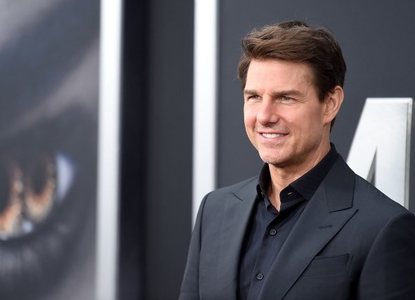 Tom Cruise — bell hop.