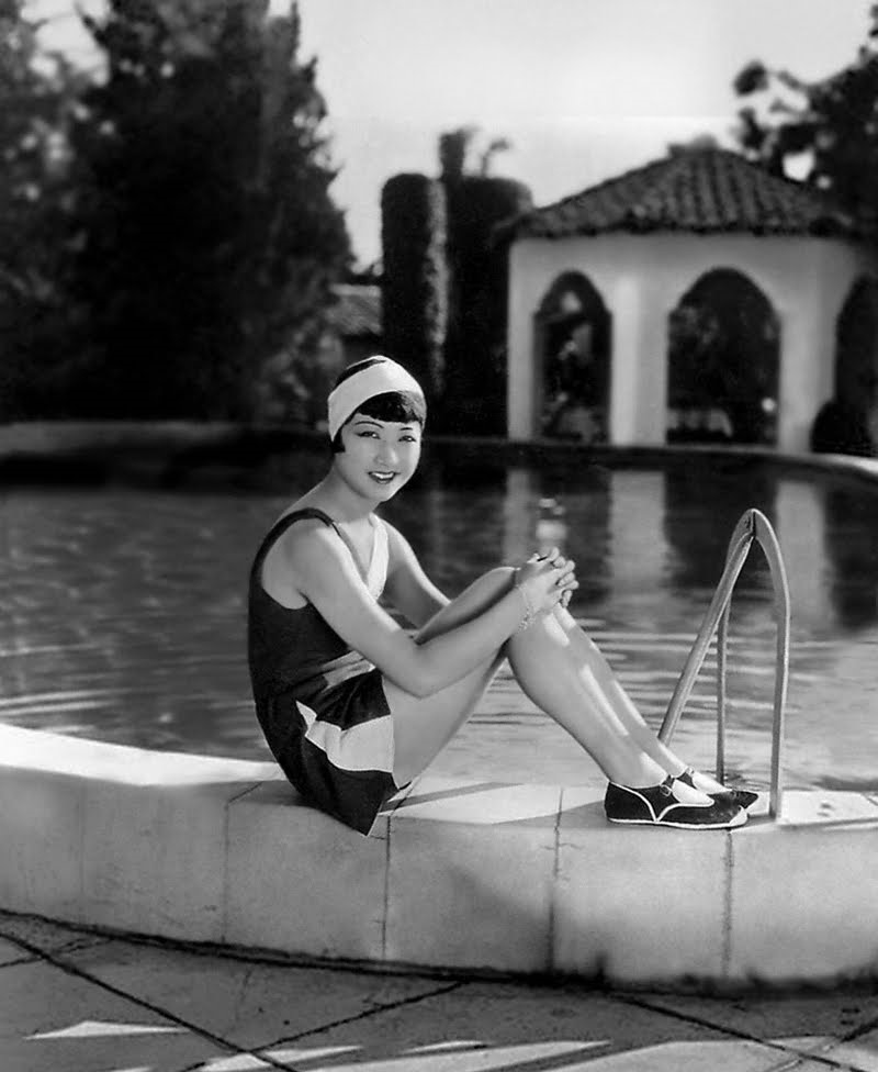 Anna May Wong hanging out at a producers home sometime in the early 1920s. She is most likely 16 or 17 in this picture. Anna started out in show business from a friend of her fathers (without his knowledge) at the age of just 14 as an extra. She has the honor of being the first Asian American movie star.