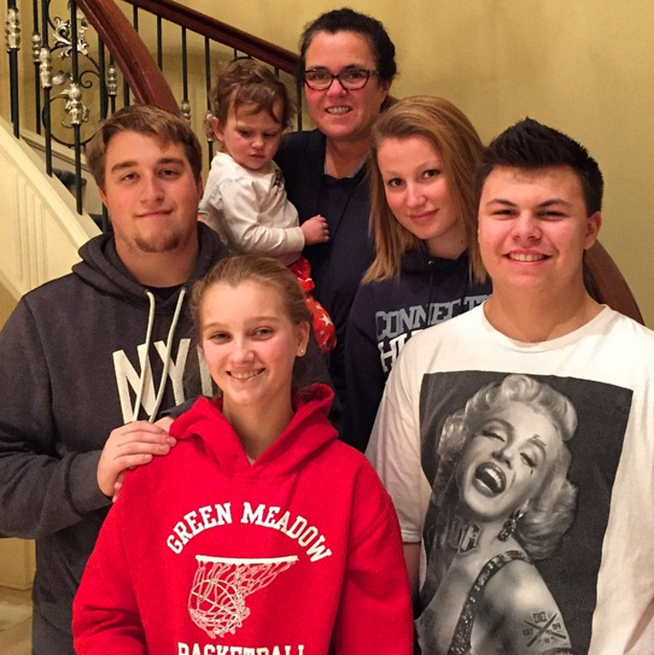 Rosie O'Donnell with her 5 children in 2016. The 3 oldest were adopted, with the one in red being born to O'Donnell's first wife Kelli O'Donnell and the youngest to O'Donnell's second wife Michelle Rounds. Rosie married Kelli in 2004, but annulled the same year. Oddly enough they stayed together for 3 more years.