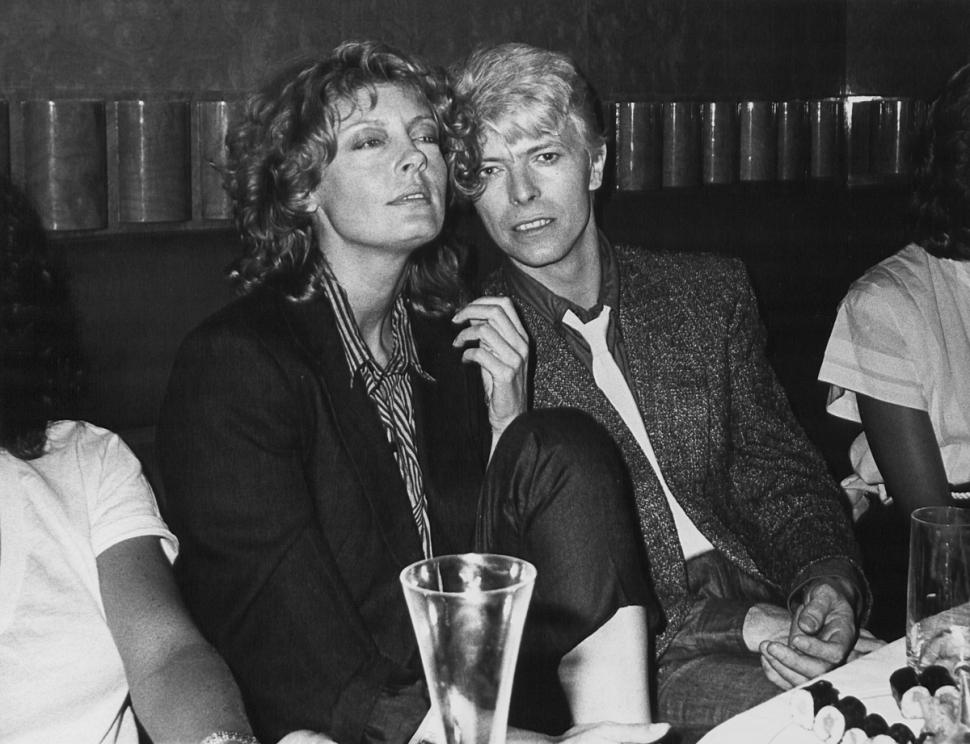 Susan Sarandon hanging out with David Bowie in 1983. The pair met while filming The Hunger together, and were secretly together for a time.