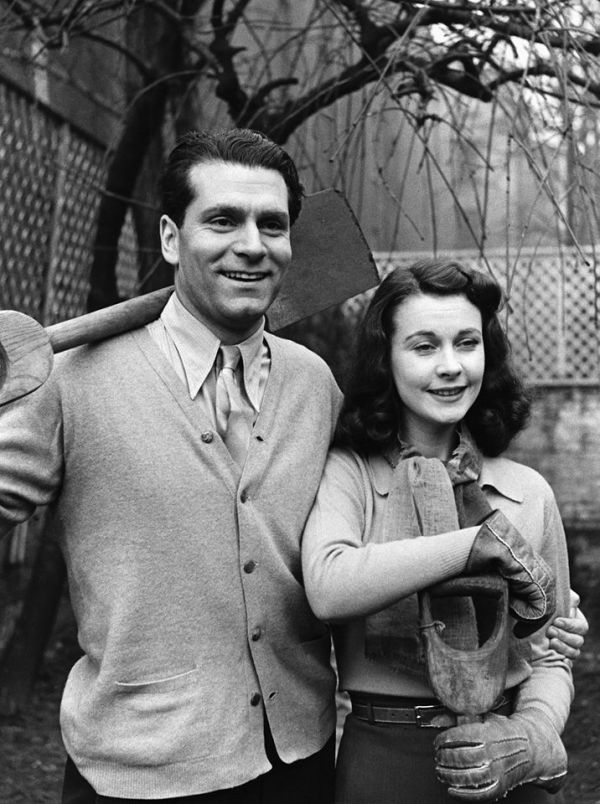 Sir Laurence Olivier and his wife Vivien Leigh take pictures for a magazine in 1941. The 2 British born actors married the year before, and were one of Hollywood's power couples until their divorce in 1961.