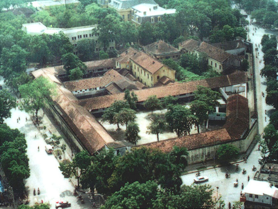 Hỏa Lò Prison. Originally opened by French colonists in 1896 to house Vietnamese rebels, the Hỏa Lò Prison ultimately became famous by a different name: the Hanoi Hilton. During the Vietnam War, Hỏa Lò Prison imprisoned American POWs like Congressman Sam Johnson and Senator John McCain, who tried to commit suicide twice during his stay. The length of the Vietnam War led to long periods of imprisonment for many POWs, some staying at the Hanoi Hilton for 8 years or more. While there, POWs were beaten, tied up by their wrists and hung from meat hooks, forced into extended solitary confinement, and used in propaganda films. They finally made it home after the Paris Peace Accords set them free and the war ended.