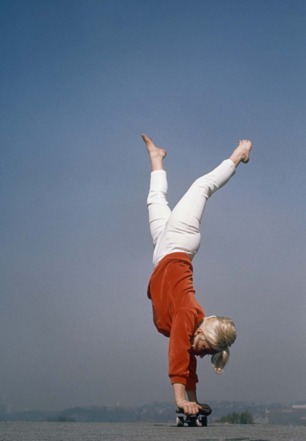 handstand on skateboard