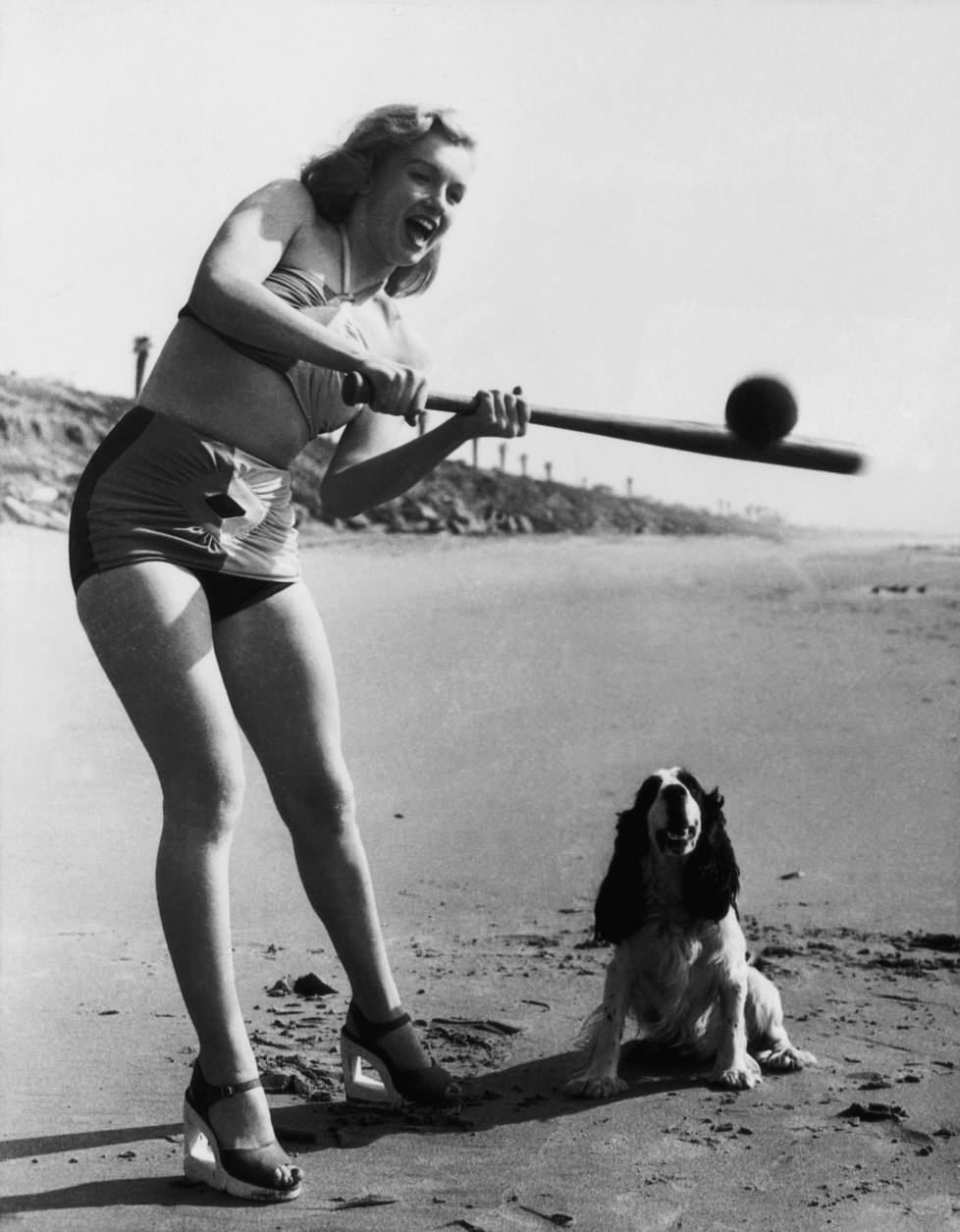 Marilyn Monroe plays Softball, 1950. Dog approves.