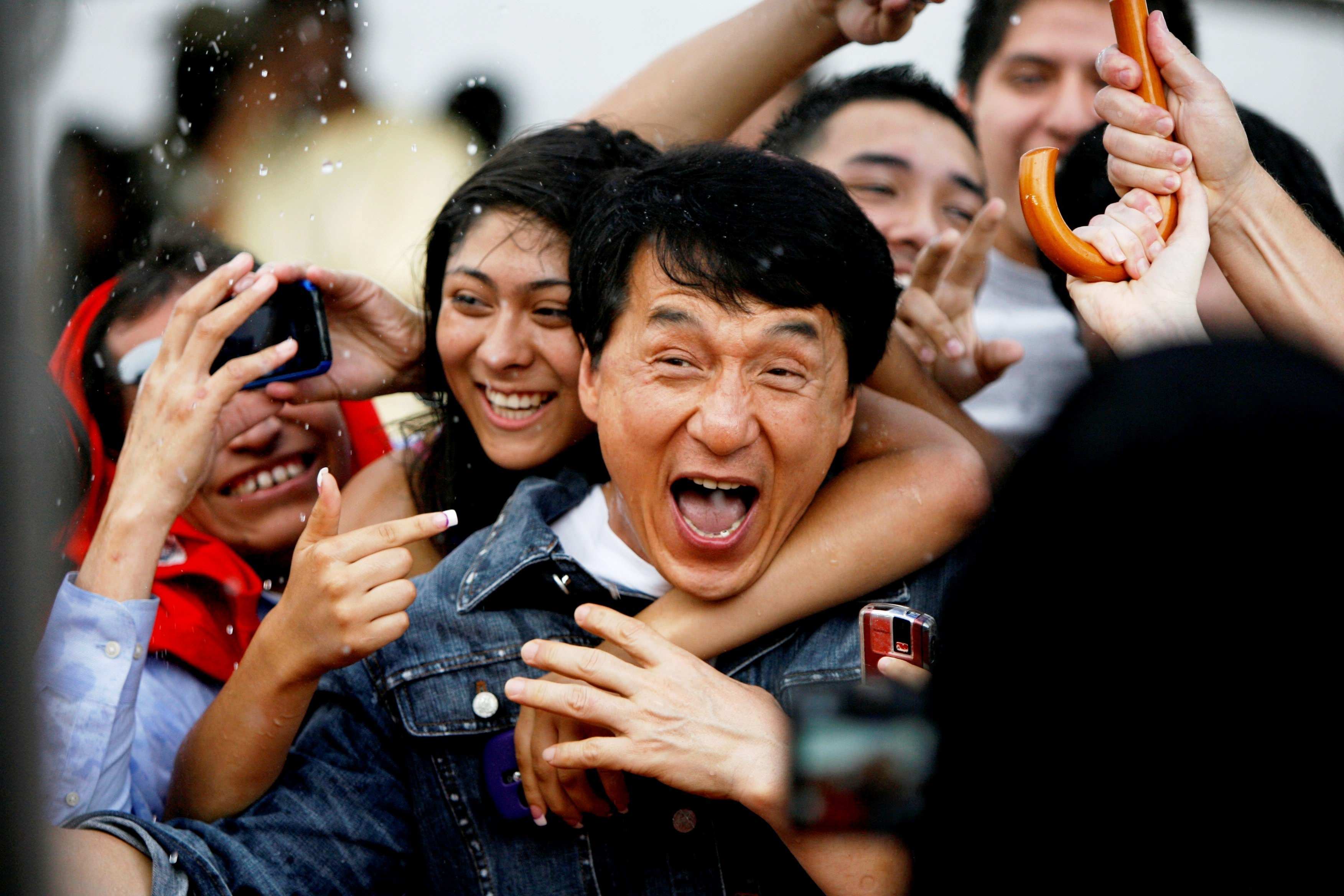 Jackie Chan getting mobbed by his fans while in India promoting a film in 2015. Chan has been known to be super friendly, always making time for fans pictures, autographs, and interactions as often as he can.