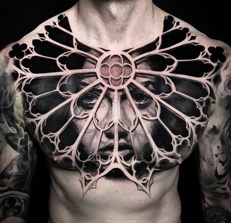 Trippy patterns tattooed on man's chest