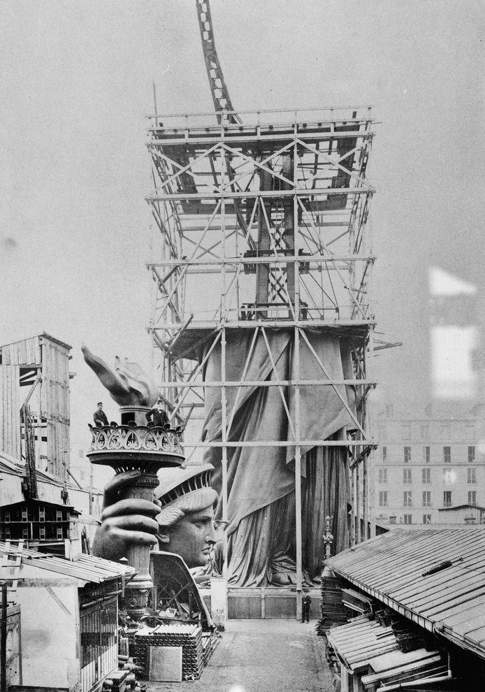 The Statue of Liberty being constructed in Paris, France in 1878. Most people don't know this but the French offered, financed, and paid to build the statue and then gifted it to the US, who only paid for the base on which it stands. Another interesting note, Gustave Eiffel, who built the world famous Eiffel Tower, also assisted in The Statue of Liberty's construction.