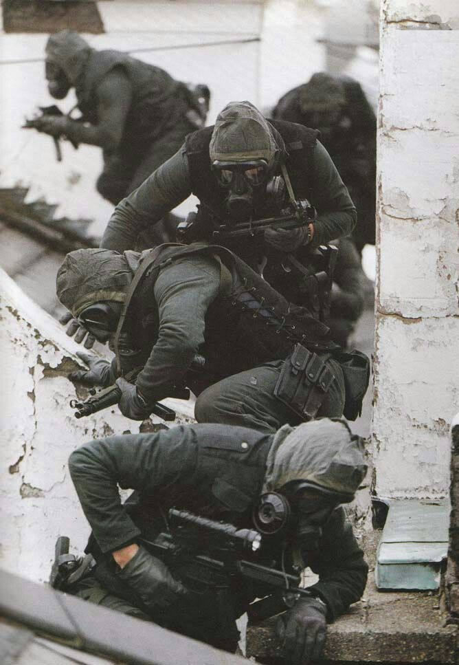 British SAS soldiers (a highly trained group of special forces) move into position for the siege on the Iranian Embassy in London, England in 1980. 6 armed men who were part of an Iranian Arab Group demanded the release of Arab nationals and their safe passage back to Arab lands. They held 26 people hostage, mostly personnel from the Iranian Embassy. After 6 days of talks, the gunman killed a hostage. Fearful of more executions, Margaret Thatcher ordered the SAS to storm the Embassy by force. In the 17 minute gun battle, all but 1 of the remaining hostages were saved and 5 of the 6 gunman were killed, the 6th being captured and prosecuted.