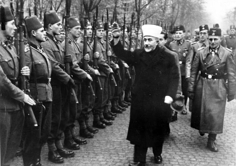 Palestinian Muslim leader Amin al-Husayni greeting Muslim Bosnian SS volunteers in November 1943. An open supporter of Nazi Germany, he even met with Hitler, did propaganda broadcasts, and helped recruit as many Muslim soldiers for the SS as he could.