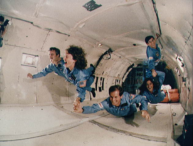 The 5 person crew of the mission STS-51-L doing training at a high altitude to simulate weightlessness in 1985. The following year they would take off along with 2 specialist and unfortunately would all die in the Space Shuttle Challenger Disaster in 1986.