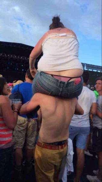 fat girl on guys shoulders