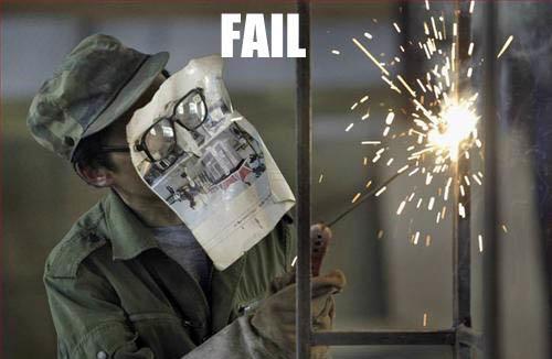 Welding using a paper to cover your face.