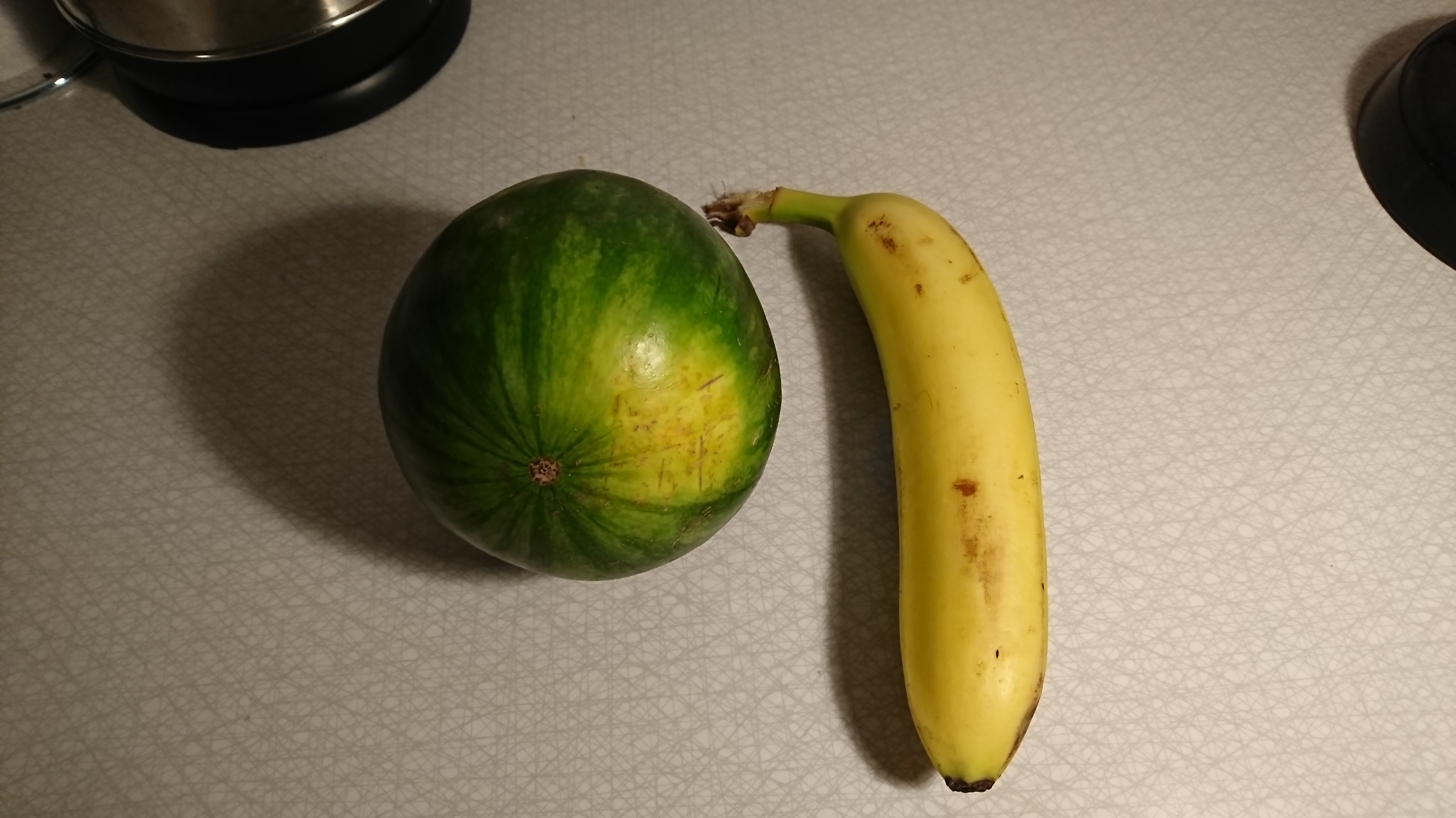 "I promised to go back to the market today and see if the melon was still there. And BEHOLD, the tiny melon was still there.With the melon now in my possession, I was gonna do this properly." "Banana for scale!"