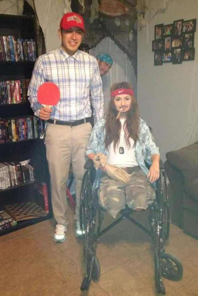 Couple cosplaying as Forrest Gump and Lieutenant Dan.