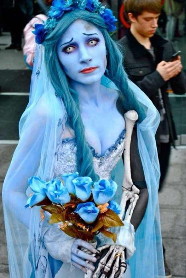 Sad blue woman cosplay to perfection
