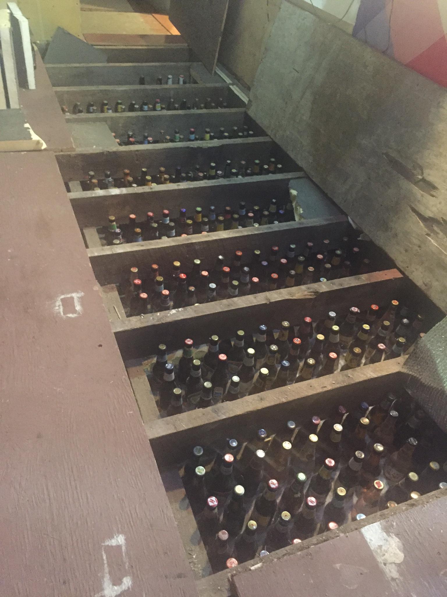 This guy's uncle recently bought a few acres and a "house" up the mountains. Trying to renovate the shack they discovered lots of beer bottles under the floor boards.
