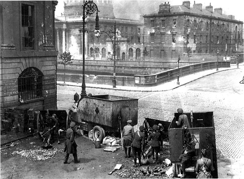 Irish Free State soldiers fire artillery on the 4 courts which are occupied by the Irish Republican Army in Dublin, Ireland in 1922. After nearly 700 years of British rule, Ireland brokered a treaty to have their own government, but gave up part of the north and had to swear allegiance to the Crown. This literally split the Irish army, and much of the population. After the Irish elected officials and the public voted in favor of the treaty, the IRA seized key government centers and the Irish Civil War erupted. What's interesting is the British supplied all the artillery, armored vehicles, and many weapons to the Irish Free State. This gave them an overwhelming advantage, and the war ended in less than a year. The 2 main Free State leaders died during the conflict. The military leader Michael Collins was shot and killed, and the president Arthur Griffith died of a heart attack a month after it started. Also, many leaders like Eamon de Valera of the IRA came back from being defeated to rejoin and lead the Irish government many years later (he himself would be president for many terms).