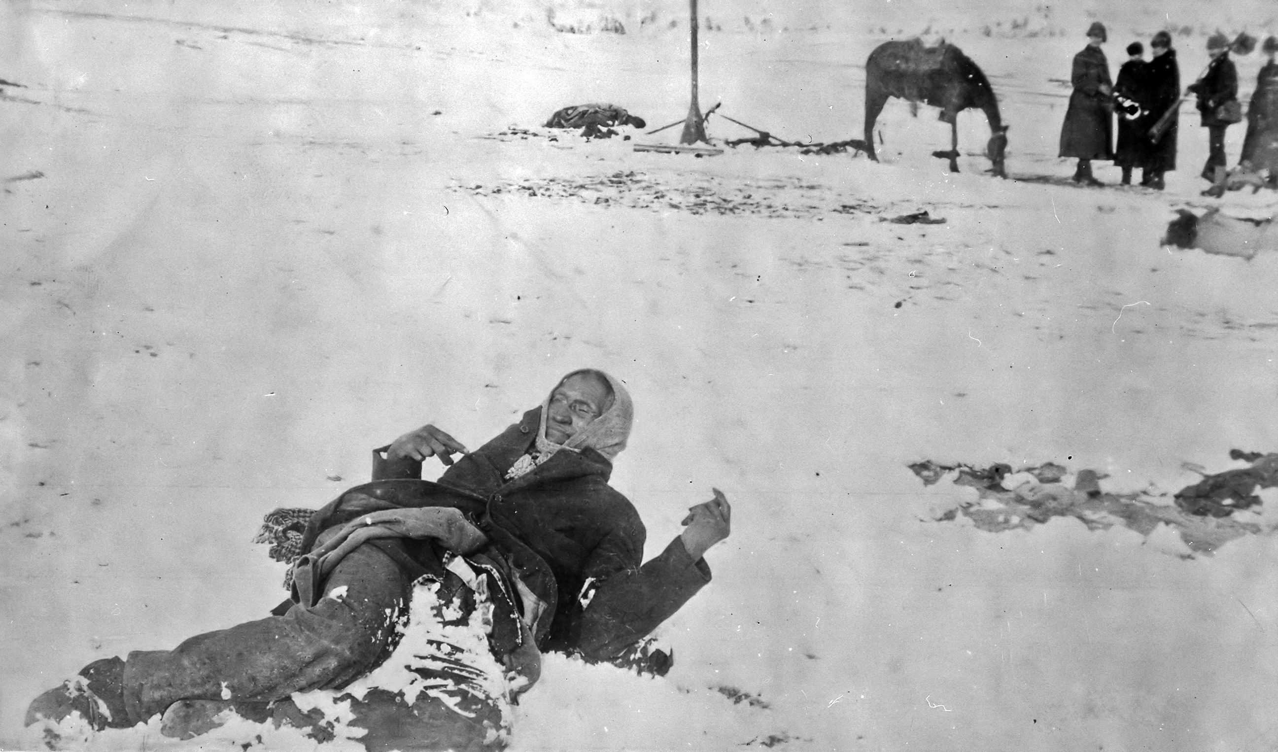 ...The soldiers did not end the fight with the warriors. They began to shoot everyone. Women, children, old, sick, unarmed, it did not matter. They massacred as many as they could. Here lies the body of Chief Spotted Elk, who was gunned down apparently trying to stop the fighting. He was unarmed. After it was over, some 90 warriors were killed, but also around 200 women and children were killed as well. They then dumped most of the bodies in mass graves like the one in the previous picture. This was one of the major events in the very ugly history of the US when it comes to their handling of Native American Indians.