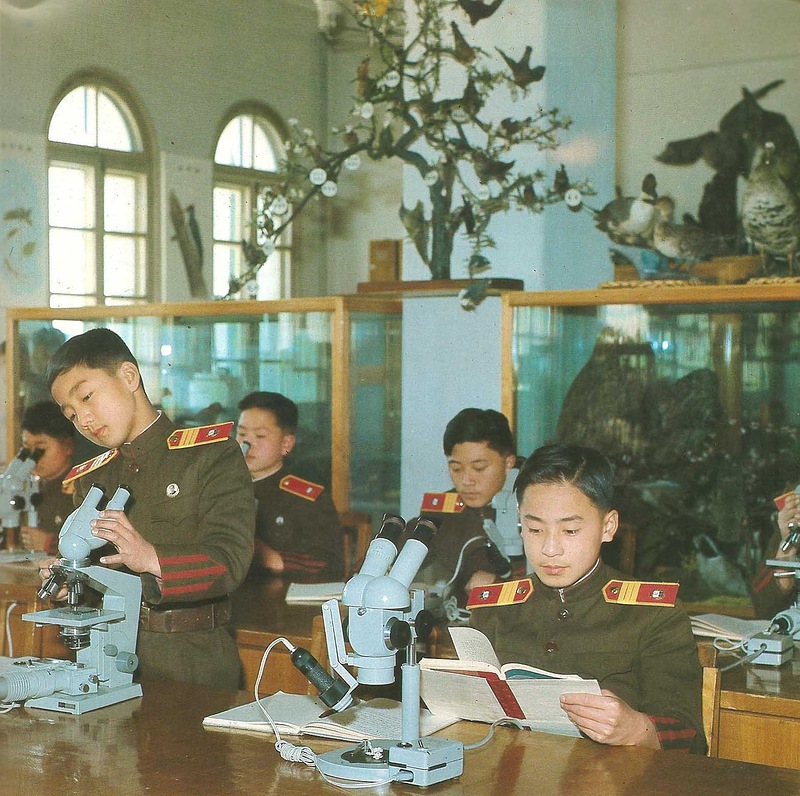 Children in a military school are granted access to a museum in this North Korean propaganda picture from 1978. It was part of a group of pictures showing privileged kids at amusement parks, museums, schools, gyms, pools, and of course at government buildings to give the illusion of the modernization of the country. The North Koreans have been doing this for almost 60 years. However, the extremely isolated population has no idea just how far behind they really are, and most probably don't care when half the time they have just a little of some basic needs such as food and water.