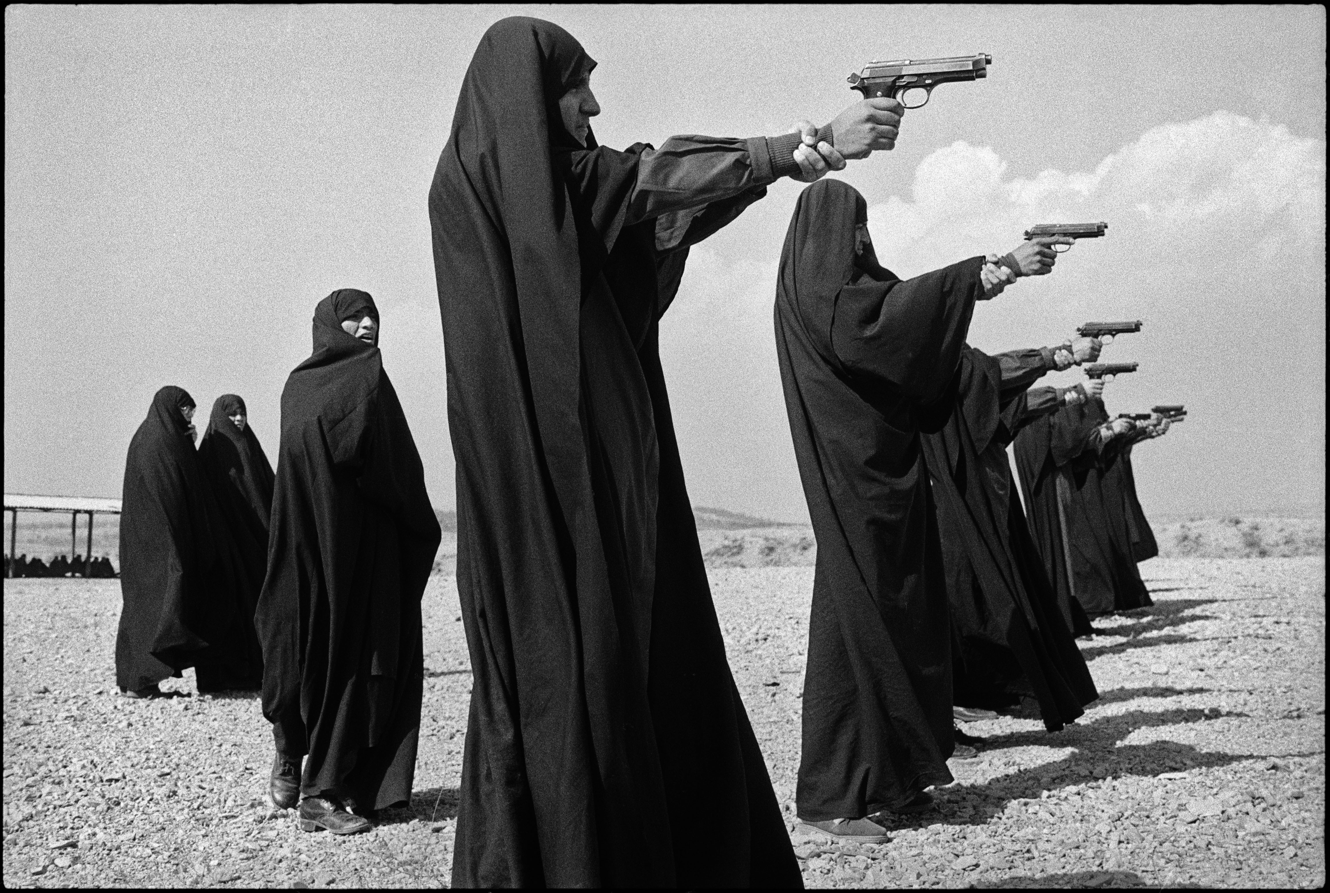 Iranian women learn to shoot at a range outside Tehran, Iran in 1986. Many of the men were away as the Iran-Iraq War was raging on. This picture was used as propaganda possibly to show other Iranian people that if Iraq started winning that the Iranian women were ready to fight. What I find interesting is only half the women in this picture are even holding their gun correctly.