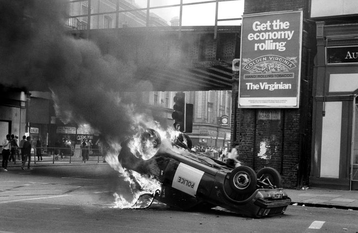 One of the 56 police vehicles to be burned during the riots in Brixton, England in 1981. During a British recession, social unrest stirred until all out rioting occurred in the city. Some 5000 people overwhelmed the police. A lot of the unrest came from racial tensions as virtually all the rioters were African Caribbean decent. No deaths were reported thankfully, but some 299 police officers were injured, with only 65 members of the public reported injured. Also, some 28 premises were burned and another 117 damaged and looted during the riots. Surprisingly, the police made only 82 arrests. Shortly after, smaller riots occurred in Leeds, Leicester, Southampton, Halifax, Bedford, Gloucester, Wolverhampton, Coventry, Bristol, and Edinburgh. Again, virtually all rioters were black and a lot of the unrest was racially driven.