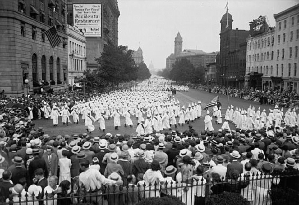 The Ku Klux Klan marches down Constitution Avenue in Washington D.C., US in 1925. Anywhere from 35,000 to 60,000 members participated in the march. At the time, the Klan had around 3 million active members. They organized in large rallies and were open about their affiliation in the 1920s. Notice no one in the parade has their hoods down. The crowd was mostly white, and as you can see there is little activity from the crowd. The people were more curious than supportive. Despite this immense show of members and power, this is actually the height of the Klan, as its numbers continuously dwindled after the 1920s.