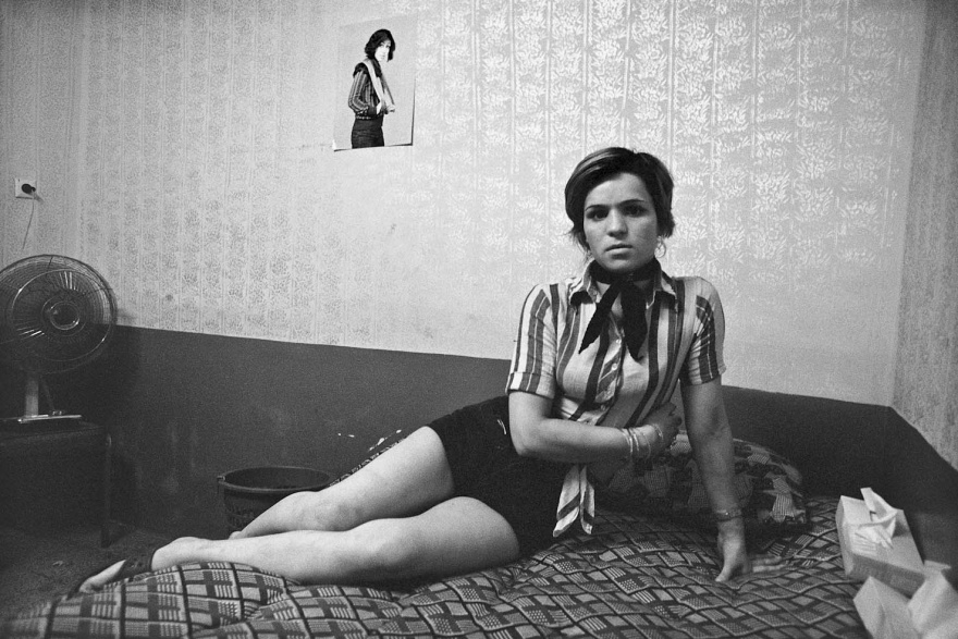 A women poses for a picture for photographer Kaveh Golestan in Tehran, Iran in 1975. This women is in fact a prostitute, and works in the red light district in the city. Golestan spent 2 years from 1975-1977 documenting these various peoples lives in the area. The Iranian Revolution of 1979 changed everything, and most of these women fled, rather than face the new heavily religious public's retaliation for their profession.