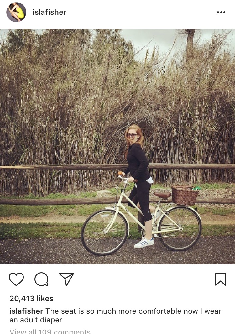 Isla Fisher on a bicycle