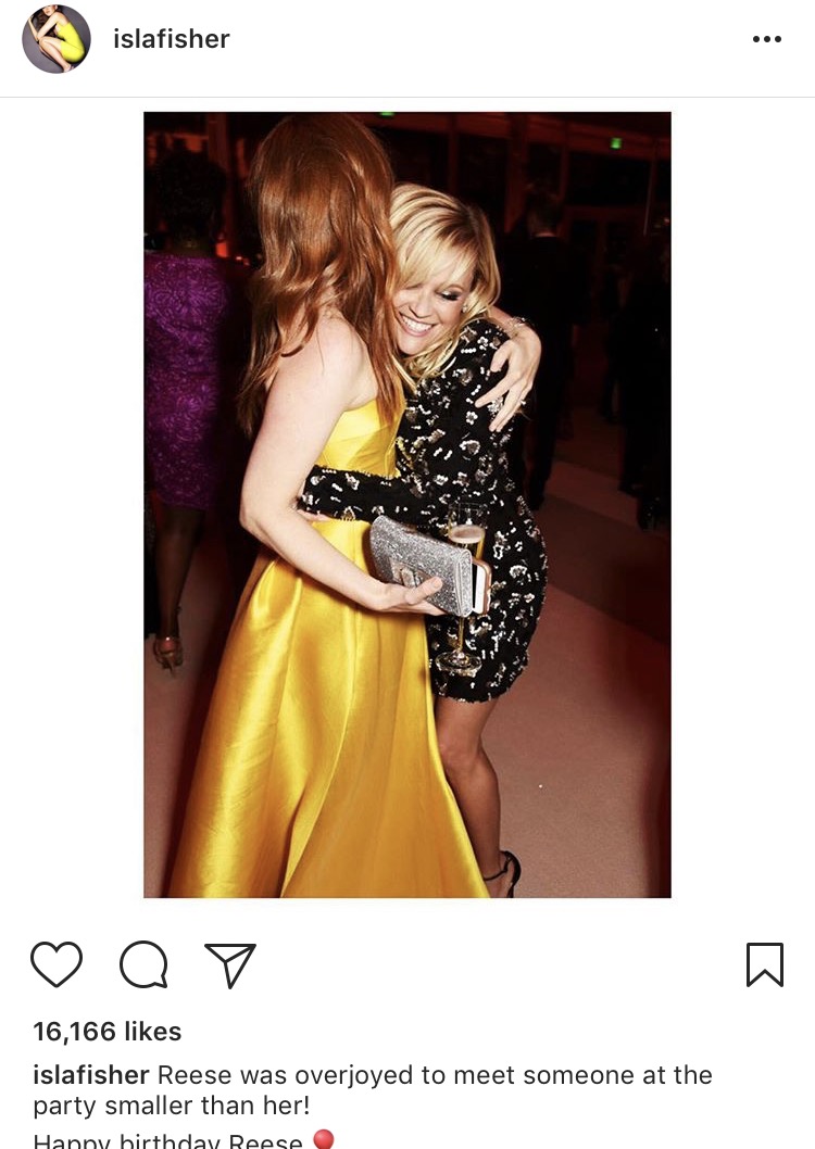 Isla Fisher hugging Reese Witherspoon