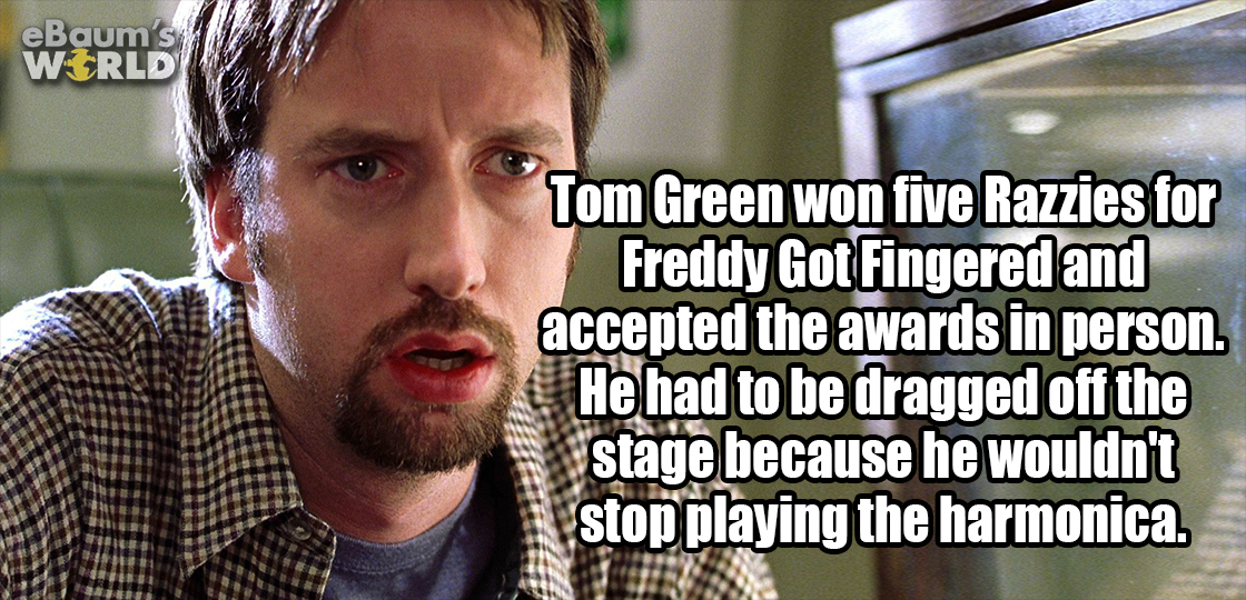 photo caption - eBaum's World Tom Green won five Razzies for Freddy Got Fingered and accepted the awards in person. He had to be dragged off the stage because he wouldn't | stop playing the harmonica.