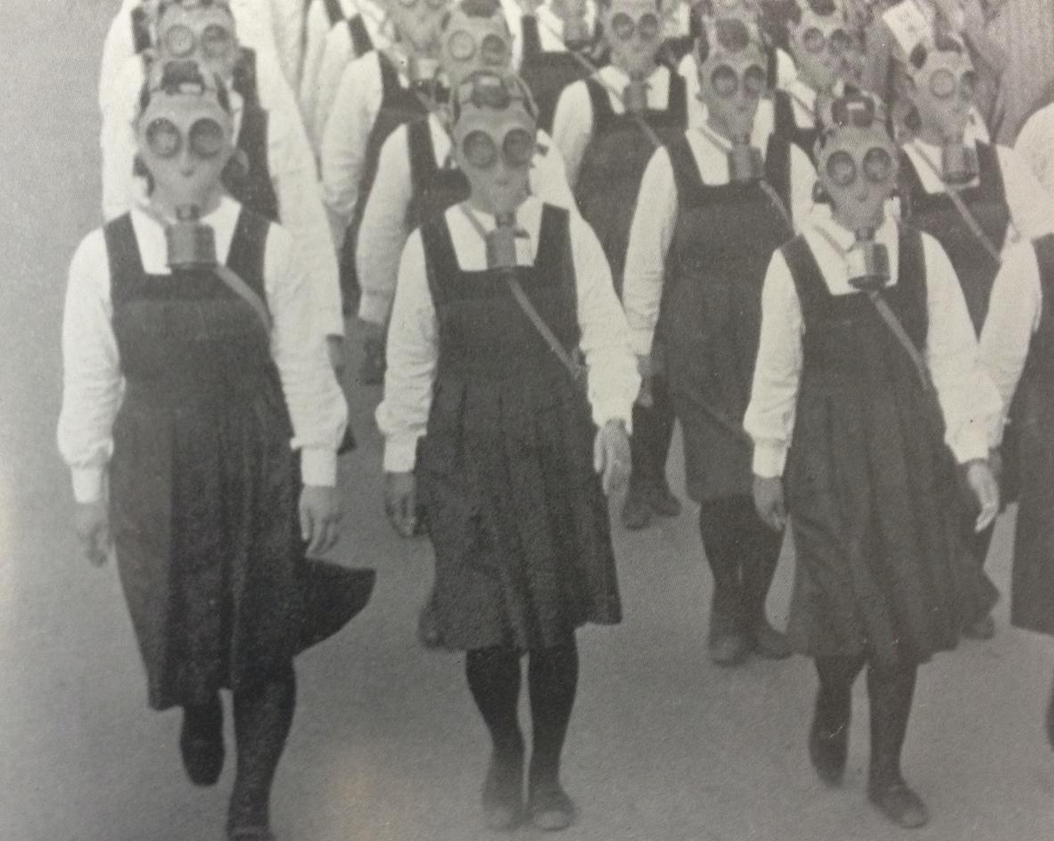 Japanese school girls wearing gas masks during a drill in Tokyo, Japan in 1943.