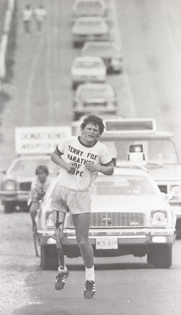Terry Fox outside Toronto, Canada, during his cross country Marathon of Hope in 1980. He was running with a prosthetic leg as he lost his leg due to his cancer. The marathon was all for cancer research and awareness and he hoped to cross the entire country of Canada. However he was forced to stop after 143 days of running, as his cancer was spreading. He would sadly die a year later, but his message made a lasting impact and help generate lots of donations and support for cancer research.