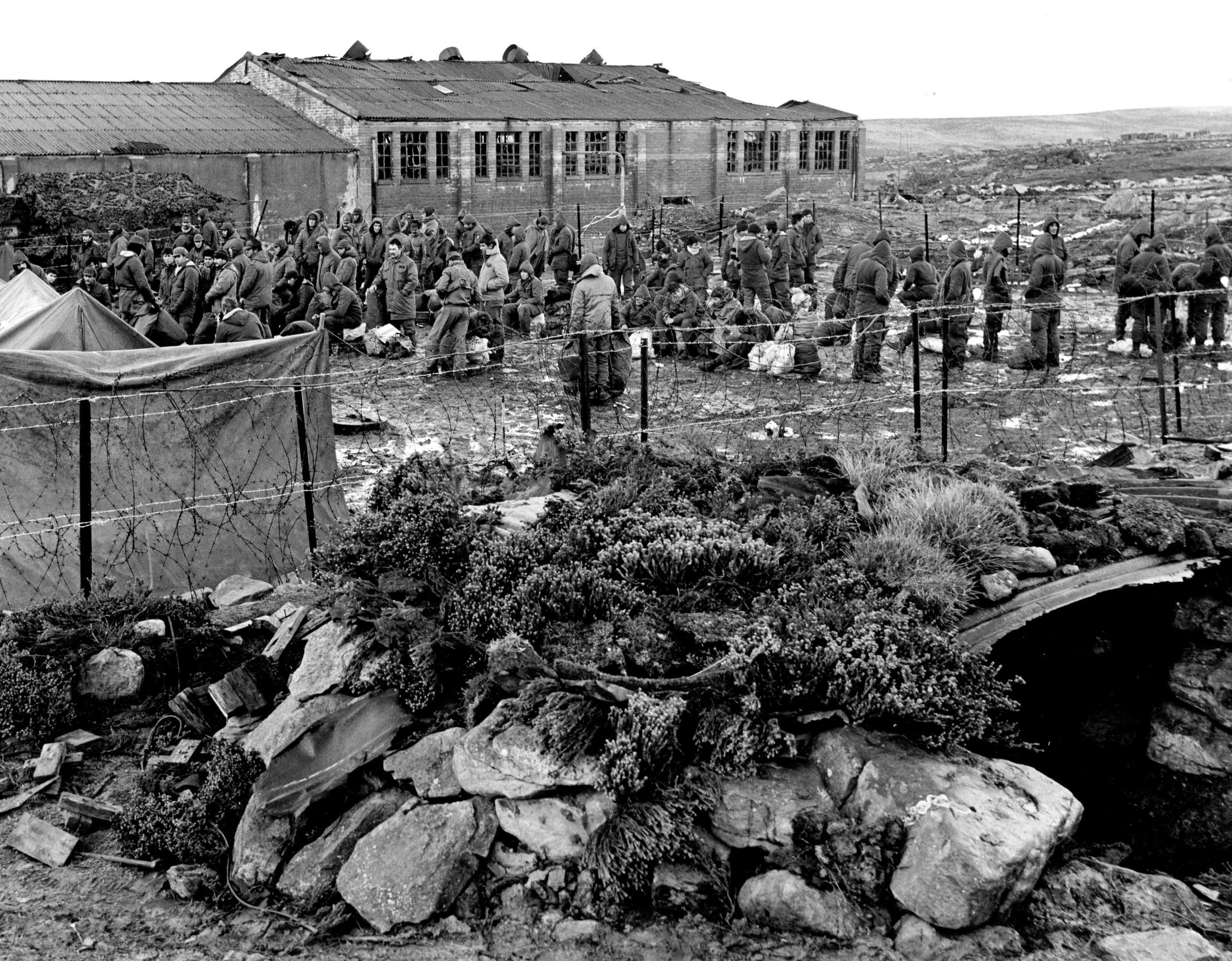 Argentinian soldiers in a makeshift POW camp somewhere on the Falkland Islands during the Falkland War in 1982. Disputes over the island triggered Argentina to occupy them. The UK would not stand for that, and launched an invasion to reclaim the islands. The 2 month war was won by the UK, who lost 225 killed with another 1000 casualties. Argentina lost 649 killed and another 13,000 casualties. The British also accidentally killed 3 civilians with inaccurate shelling. The way the British forced the issue for islands that were believed to have no real value surprised the world. In the end though, no other nation stepped in outside of debates on the UN floor.