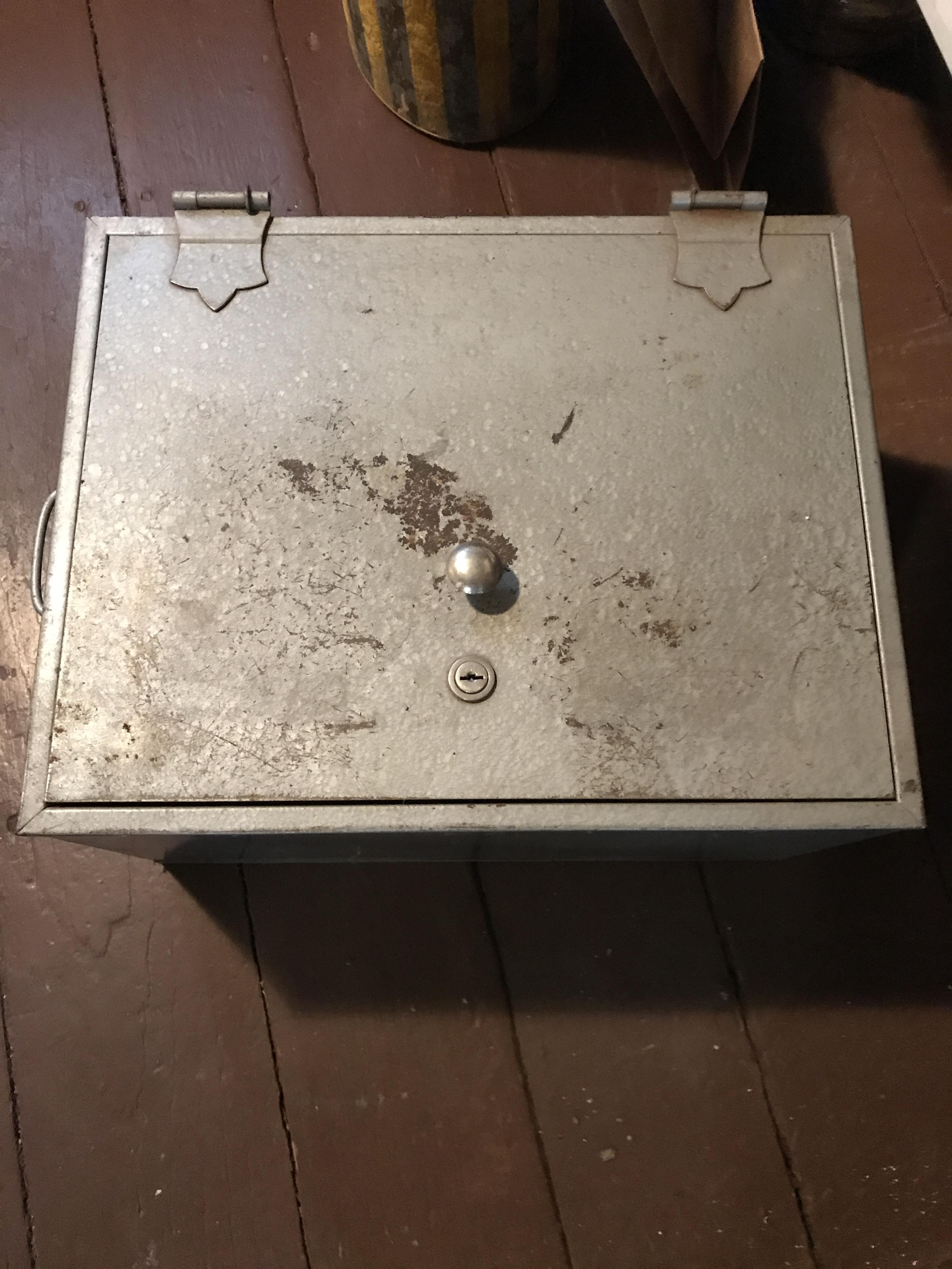"Found an old lock box in my grandmas house. House has been sitting mostly vacant for about 10 years as we just kept it open for family friends to use when visiting."