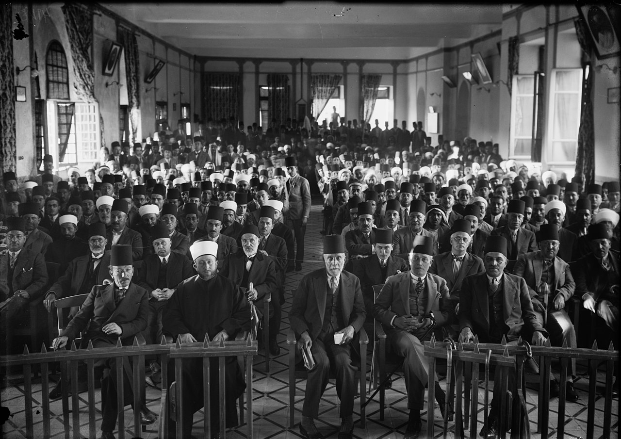 Gathering of Arab locals who would discuss how to handle the Jews, 1928. A year later, it escalated into the violence showen in the picture before. The rioters destroyed homes, synagogues, sacred Jewish items and ancient texts, and forcing 17 full Jewish communities to abandon their homes. The rioting took a week, and it's safe to assume many in the picture either orchestrated or took part as these were many of the key leaders of anti-Jewish demonstrations.