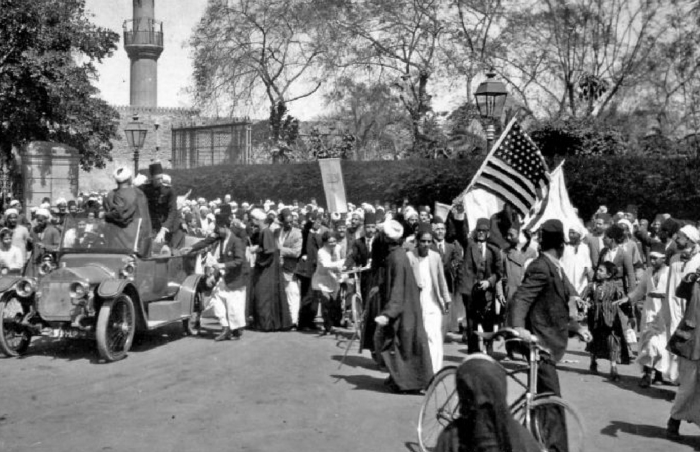 A man waves the American flag in Cairo, Egypt in 1919. This was during the Egyptian Revolution against British control of Egypt and Sudan. The Egyptians sought American support for their independence, which the US refused. Clashes caused the death of 800+ Egyptians, and another 1600 wounded. Around 30 British solders were killed. In other attacks, another 30 or so European citizens were also killed in the fighting by Egyptian mobs. To resolve the issue, the British recognized the Egyptian Independence, but did not remove troops from either Egypt or Sudan. They would remain all the way through WWII and after, in force, but allow the Egyptians to create their own government and police themselves in a way. Sudan was not allowed any kind of independence until both Sudan and Egypt were completely independent of any British influence in the revolutions of 1956.