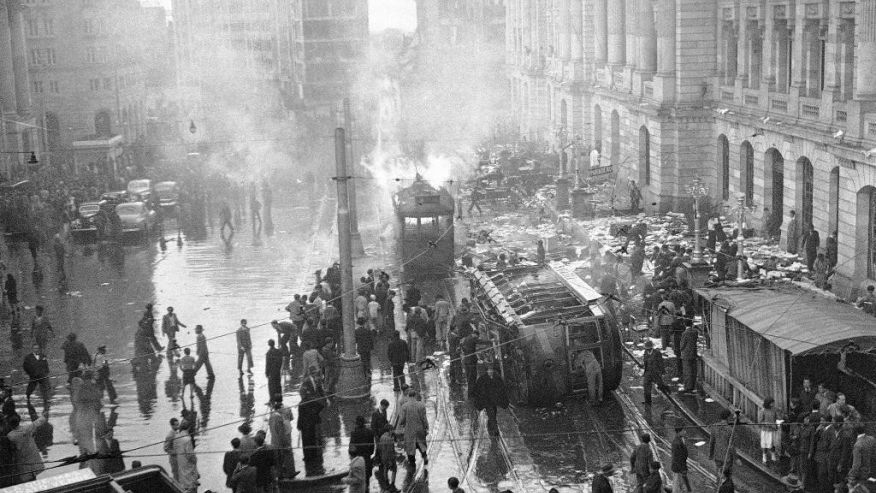 People review the damage caused by massive riots in Bogota, Colombia in 1948. This was known as El Bogotazo which happened after the assassination of Liberal leader and presidential candidate Jorge Eliécer Gaitán. The 10 hour riot destroyed much of the city. Colombia had been at odds over political control of the country for nearly 20 years before this event. Following the assassination, another period known as La Violencia ("The Violence") lasted until 1956.