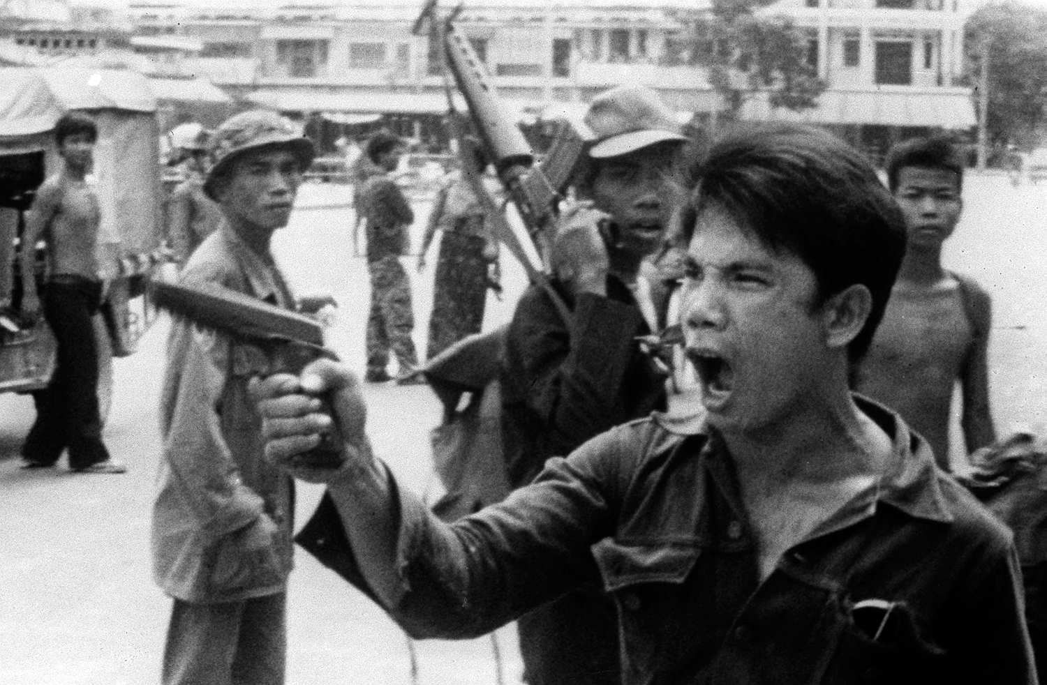 A Khmer Rouge soldier waves his pistol and orders store owners to abandon their shops in Phnom Penh, Cambodia, in 1975. The capital fell to the communist forces, and immediately all property and ownership ceased for its citizens. This was as the Khmer Rouge won the 8 year long Cambodia Civil War, but that did not stop the fighting or the killing. Under their leader Pol Pot, The Khmer Rouge were ruthless, and began a campaign of genocide against the people. While in full control of the country, the Khmer Rouge killed up to 3 million people in just 4 years. Over 23,000 mass graves have been discovered. Men, women, children, the Khmer Rouge killed them all. It got so bad that even Vietnam invaded Cambodia, despite both being communist, and eventually the Khmer Rouge lost control of the country. However they would continue to fight a guerilla war even holding key areas of the country until finally being defeated 20 years later in 1999.