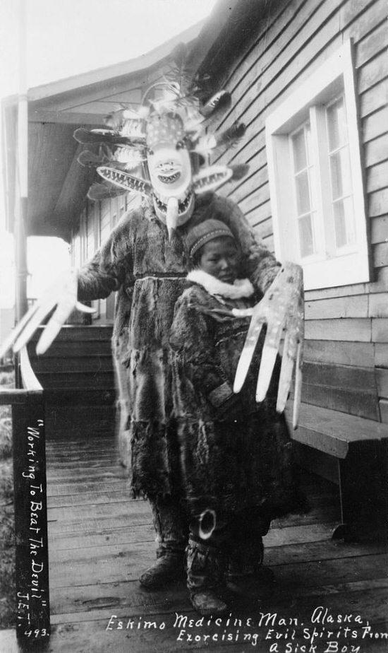 An Eskimo medicine man from the Yup'ik tribe preparing to perform a ritual in Alaska territory, US in 1897.